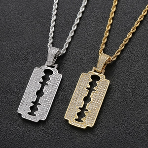 Hip-hop razor blade pendant necklaces in gold and silver with micro-paved zircons