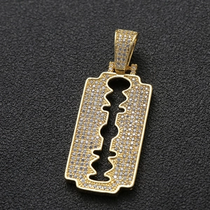 Iced out gold razor blade pendant necklace with sparkling micro pave zircon stones