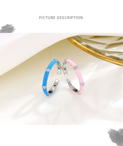 Detailed close-up of S925 sterling silver adjustable rings with colorful enamel and diamonds