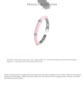 Detailed close-up of S925 sterling silver ring with pink enamel and small diamonds