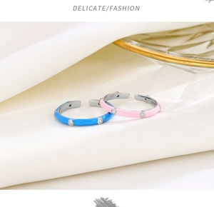 Close-up of S925 sterling silver enamel rings with colorful zircon inlays and adjustable band