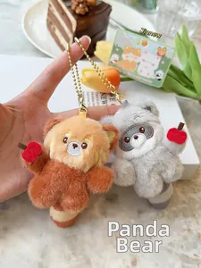 Detail of red panda plush keychains with magnetic connection and golden bead chains