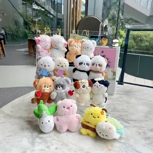 Cute magnetic plush animal keychains featuring bears, pandas and sheep on a display stand