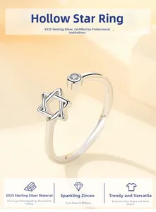 Detailed macro view of S925 sterling silver hollow star ring with a sparkling zircon stone