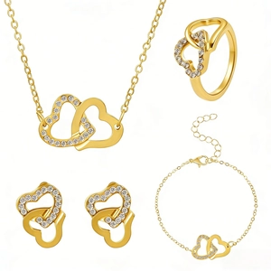 Ensemble de bijoux 4 pièces dorés avec cœurs entrelacés et cristaux blancs étincelants