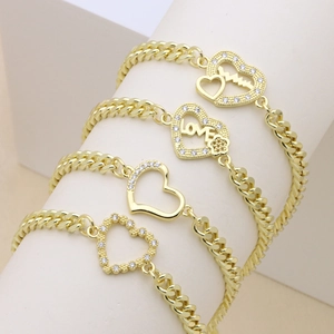 Set of four gold heart bracelets with cubic zirconia and Cuban chain links