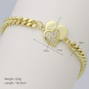 Detail of gold curb chain bracelet with heart pendants, lobster clasp and extension chain