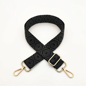 Adjustable woven replacement bag strap with grey geometric pattern and gold hardware