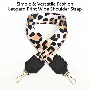Adjustable leopard print wide shoulder strap with gold metal buckles and black PU leather