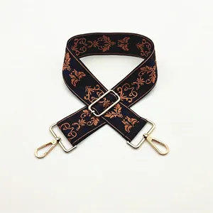 Ethnic embroidered dark blue bag strap with vintage pattern and gold metal hardware