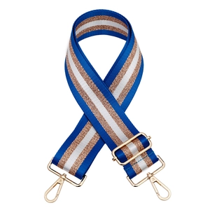 Adjustable woven shoulder strap in blue and gold stripes with metallic hardware