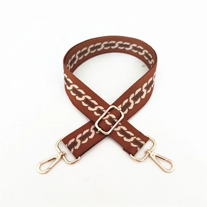 Adjustable brown and cream chain pattern wide bag strap with gold metal lobster clasps