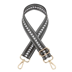 Adjustable wide black canvas shoulder strap with white chevron patterns and gold metal clips