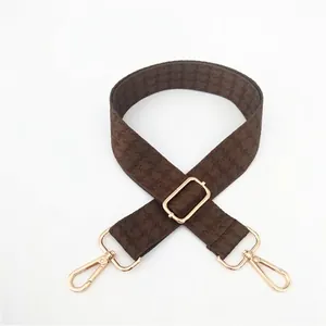 Adjustable brown houndstooth strap with gold metal buckles for crossbody bags