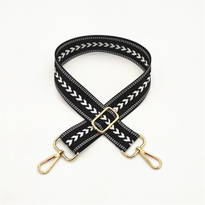 Adjustable black and white woven chevron bag strap with polished gold-tone hardware buckles