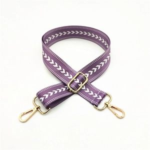 Adjustable purple replacement shoulder strap with white geometric pattern and gold buckles