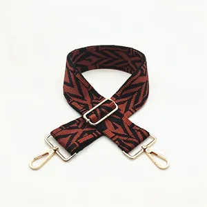 Adjustable wide replacement bag strap with brown and black geometric zigzag weave