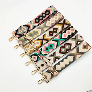 Adjustable woven purse straps with geometric rhombus patterns and gold metal buckles