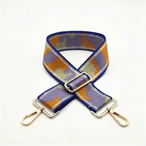 Detail view of thickened adjustable camouflage strap with golden metal lobster clasps