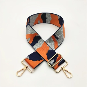 Adjustable wide replacement shoulder strap with orange and silver camo pattern and gold clips