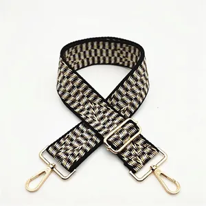 Adjustable wide replacement bag strap with ethnic chevron pattern and gold metal hardware