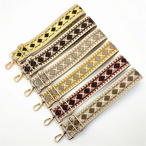 Adjustable geometric diamond pattern wide shoulder straps with gold metal clasps for handbags