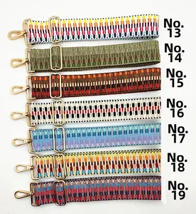 Detail showing seven adjustable woven shoulder straps with geometric patterns and gold hooks