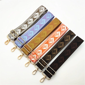 Adjustable wide replacement bag strap with geometric diamond jacquard pattern and gold clips