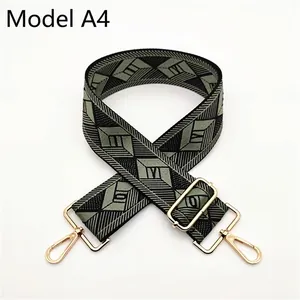 Detail of adjustable rhombus pattern shoulder strap in olive green with gold hardware