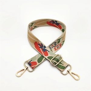 Adjustable woven replacement strap with floral print and gold lobster clasps for handbags