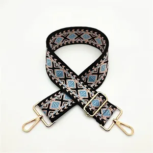 Detail of diamond pattern woven shoulder strap for bags with golden metal hooks, style No. 16