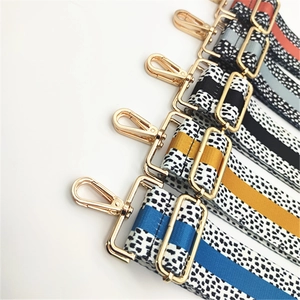Adjustable woven bag straps with polka dot pattern and gold metal swivel snap hooks
