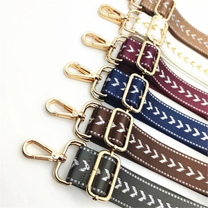 Adjustable woven canvas replacement straps with geometric patterns and gold metal buckles
