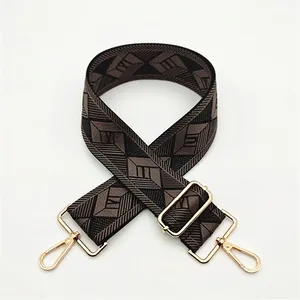 Adjustable wide replacement strap with brown geometric patterns and gold metal hooks