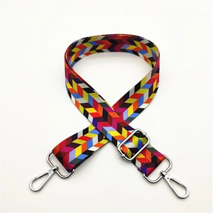 Close-up of multicolor woven guitar style adjustable strap with silver lobster hooks