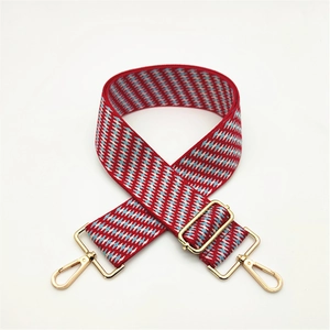 Adjustable wide woven guitar-style shoulder strap with red blue geometric rhombus pattern