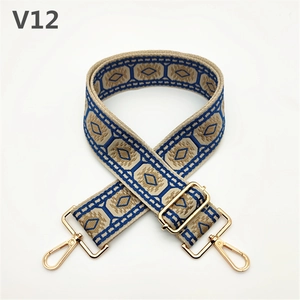 Detail of adjustable thickened woven strap with blue ethnic pattern and gold buckles