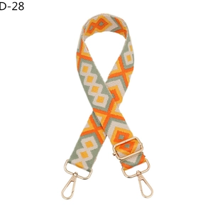 Adjustable wide canvas shoulder strap with colorful geometric rhombus patterns and gold hardware