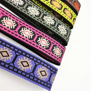 Close-up of ethnic geometric pattern jacquard strap with intricate diamond embroidery texture
