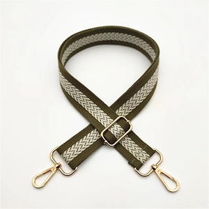 Adjustable military green woven shoulder strap with herringbone pattern and gold hardware