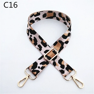Detail of adjustable leopard print bag strap with high-quality gold swivel lobster clasps