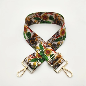 Adjustable wide canvas bag strap with colorful sunflower floral print and gold metal hooks