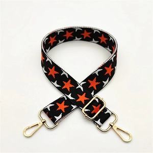 Thickened woven bag strap with orange star patterns and gold-tone adjustable metal hooks