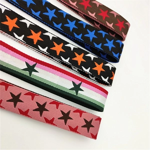 Detail showing various colorful star pattern woven jacquard straps for handbags