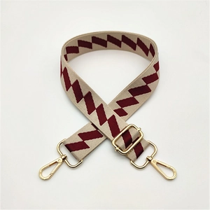 Adjustable woven shoulder strap for handbags with burgundy geometric pattern and gold hardware