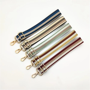 Adjustable colorful striped fabric bag straps with gold metal hardware in five vibrant colors