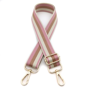 Adjustable striped handbag replacement strap with gold metal hooks on white background