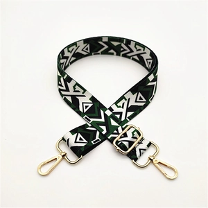 Adjustable wide canvas shoulder strap with geometric pattern and gold hardware
