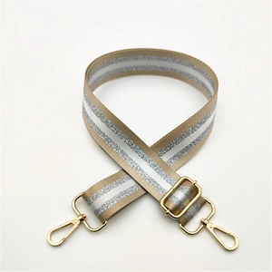 Adjustable woven strap with gold metal buckles and three-stripe metallic silver detail