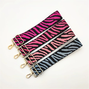 Adjustable zebra pattern wide shoulder straps with gold hardware in multiple colors
